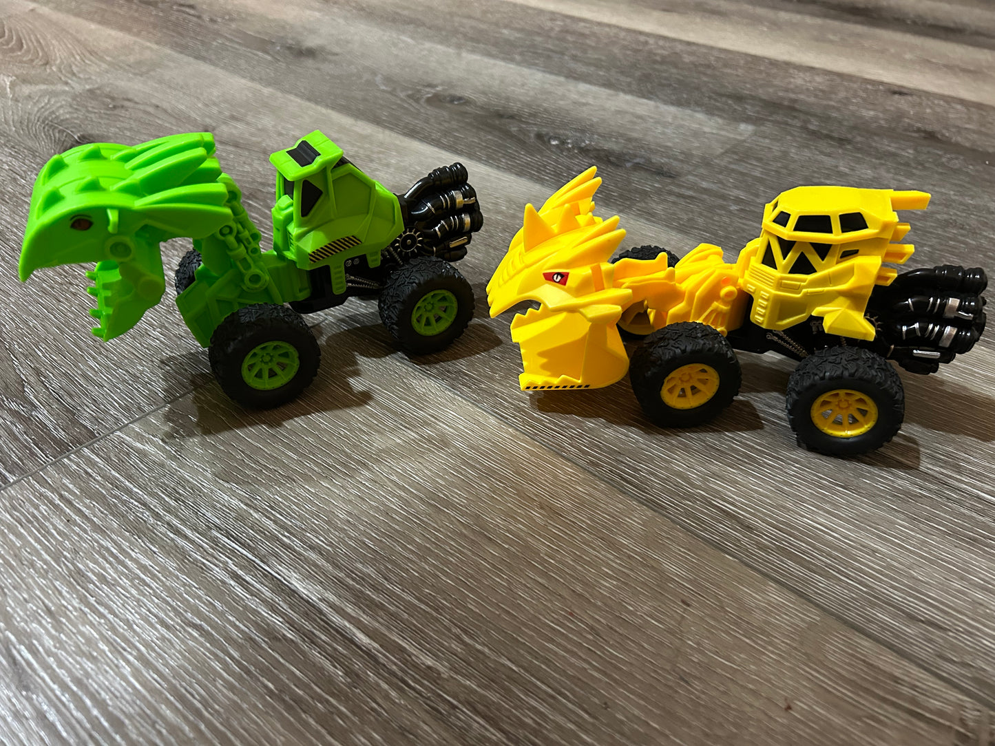 2 toy vehicles